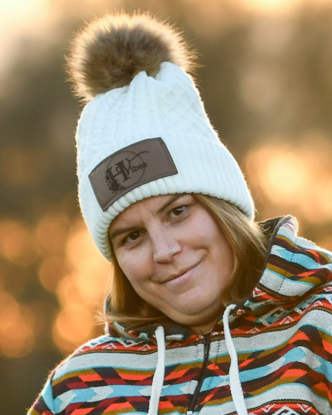 Cream beanie with pompom for women