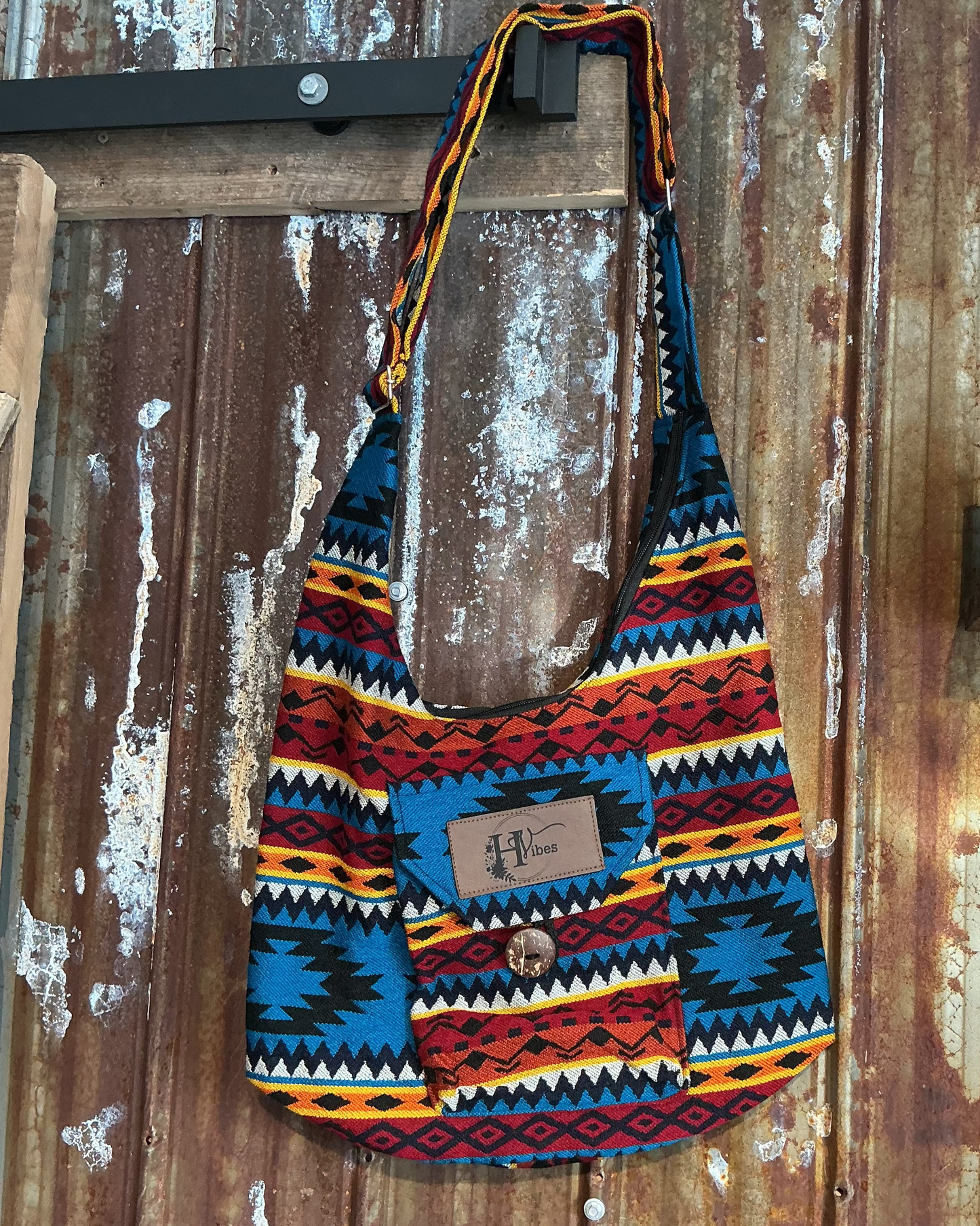 Sac à bandoulière rouge et bleu 1